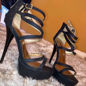 Black snake print stiletto pumps